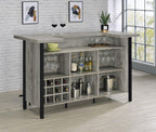 Coaster 182105 Darby home co Ansel grey driftwood finish wood home bar unit with foot rail bottle and glass storage racks