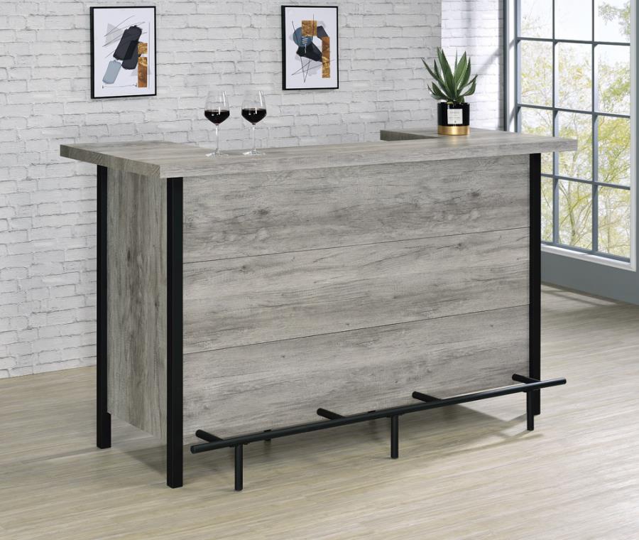 Coaster 182105 Darby home co Ansel grey driftwood finish wood home bar unit with foot rail bottle and glass storage racks