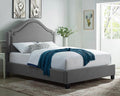 8644-Q Franklin grey fabric padded bronze nail head trim queen bed with rounded top