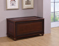 Coaster 900012 Darby home co moran deep tobacco finish wood cedar lined storage trunk chest with carved accents