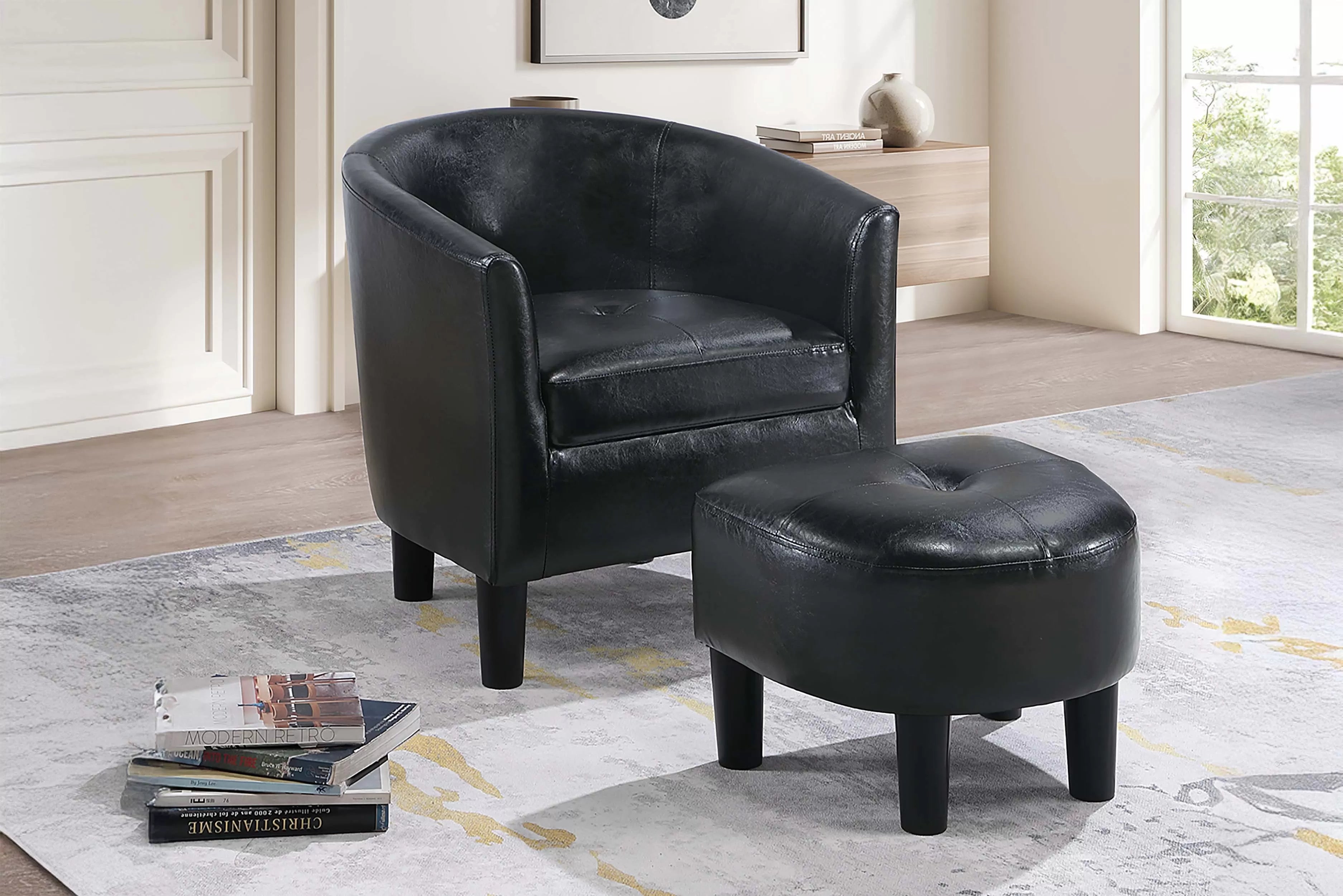 Poundex F1944 Black faux leather barrel back accent chair with black tapered legs