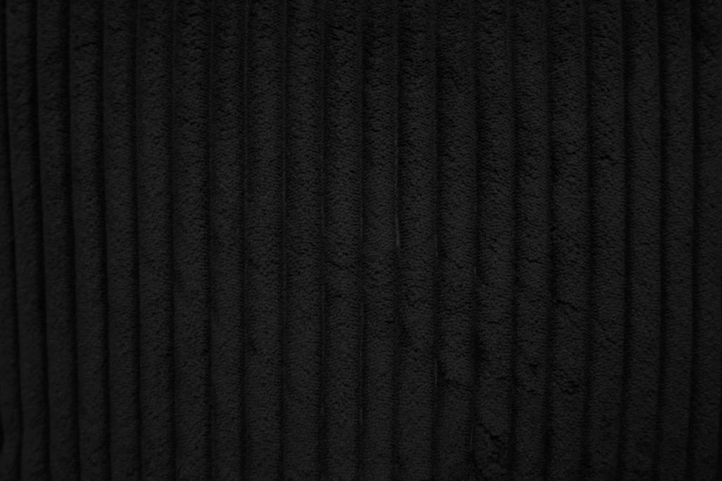 Poundex F8572 2 pc black corduroy sectional sofa set pull out sleep area with reversible pop up storage chaise cup holders and USB ports