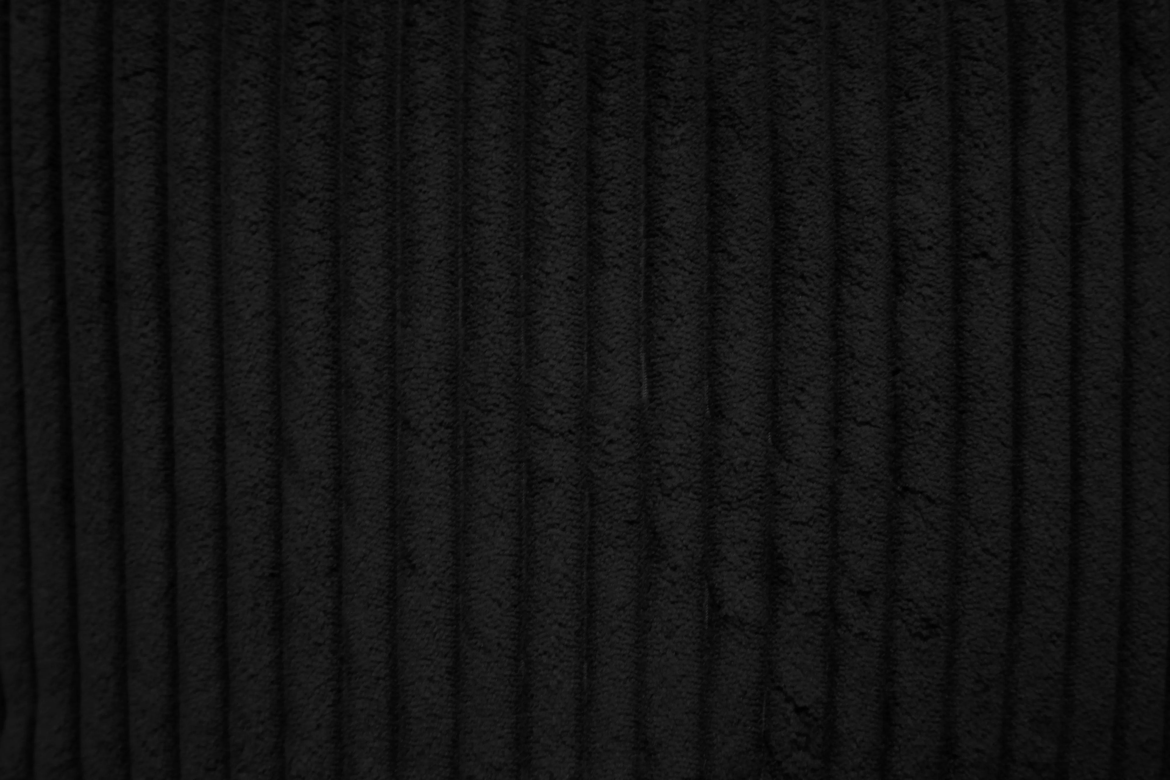 Poundex F8572 2 pc black corduroy sectional sofa set pull out sleep area with reversible pop up storage chaise cup holders and USB ports