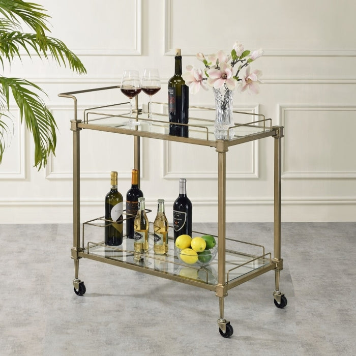 Acme AC02597 Aditya antique brass metal finish frame and clear glass top and bottom shelf kitchen island tea / bar cart