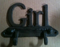 Cast iron girl wall hanger