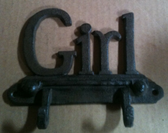 Cast iron girl wall hanger