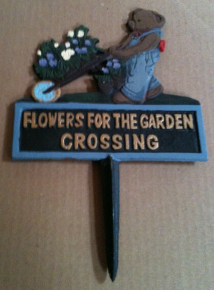 Cast iron garden stake bear w/wheel barrell