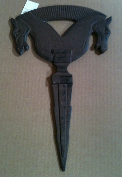 Cast iron two horse heads garden stake
