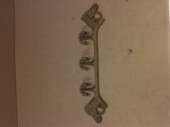 Cast iron antique light brown three hook two headed horses wall hanger