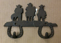 Cast iron cowboys on horses double hook wall hanger