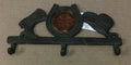 Cast iron three hook hanger