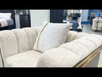 2 pc Chateau beige textured fabric upholstered paneled arms gold trim accents sofa and love seat set